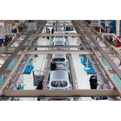 Automotive assembly line with conveyors, stations, and tooling