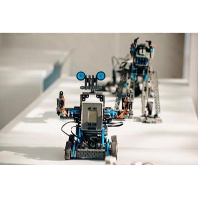 Welding and painting robots in an automotive plant