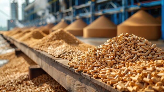 Wood pellets on a conveyor belt in a production facility