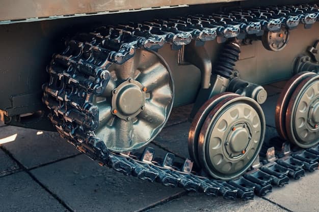 the caterpillar of a heavily armed military tank The concept of a fire conflict