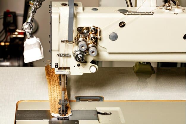 Industrial sewing machine for the manufacture of furniture upholstery