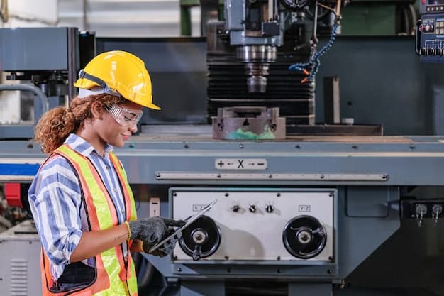 Female engineer checking machine system