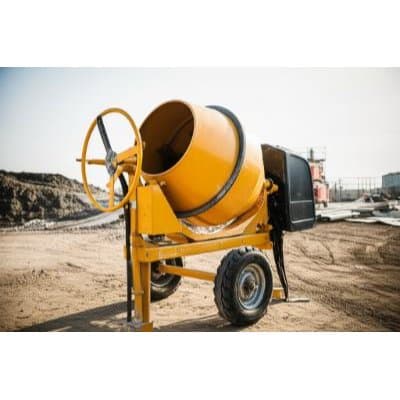 Concrete mixers and material handling equipment on a construction site