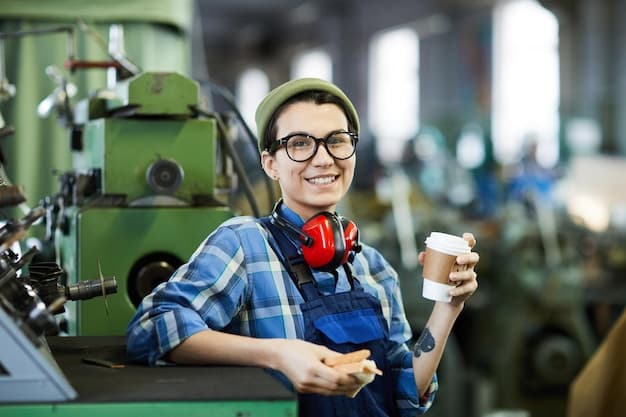 Hipster girl worker drinking coffee at factory