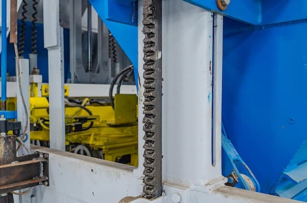 Part of molding machine for production of paving slabs close-up industrial background