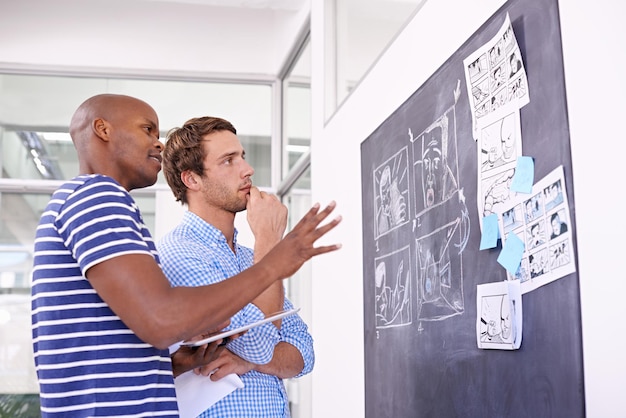 Reliability engineer and two technicians gathered around a monitor reviewing a Fishbone diagram for a recurring pump failure, with the affected equipment visible in the background